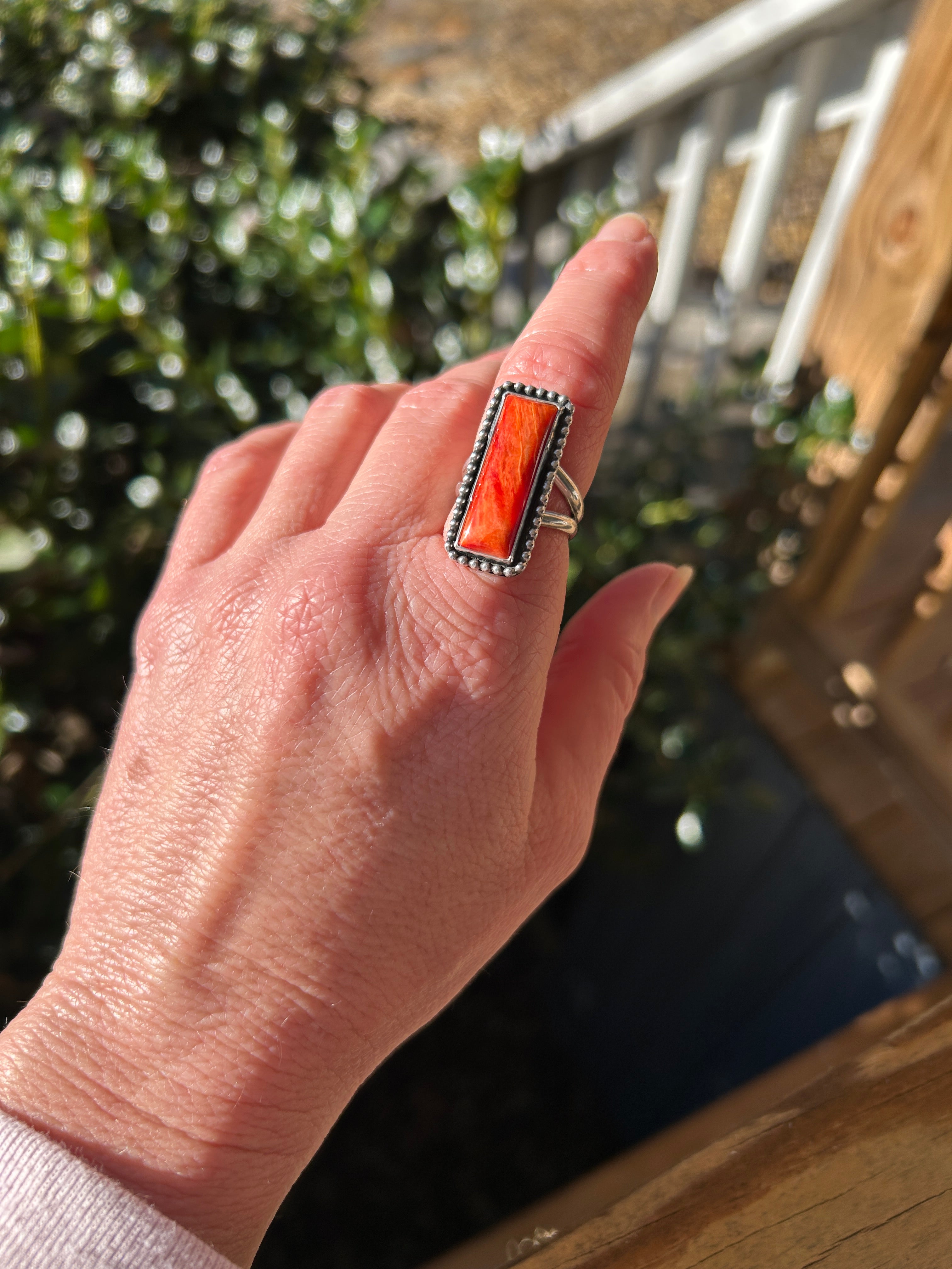 Orange spiny bar ring size 6.75