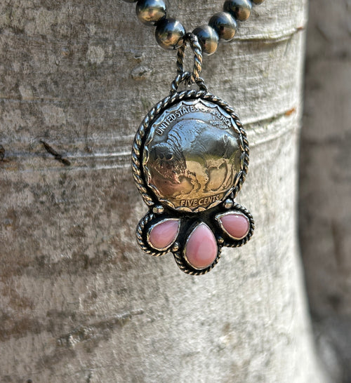 Buffalo nickel and pink conch pendant