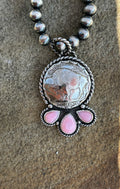Buffalo nickel and pink conch pendant