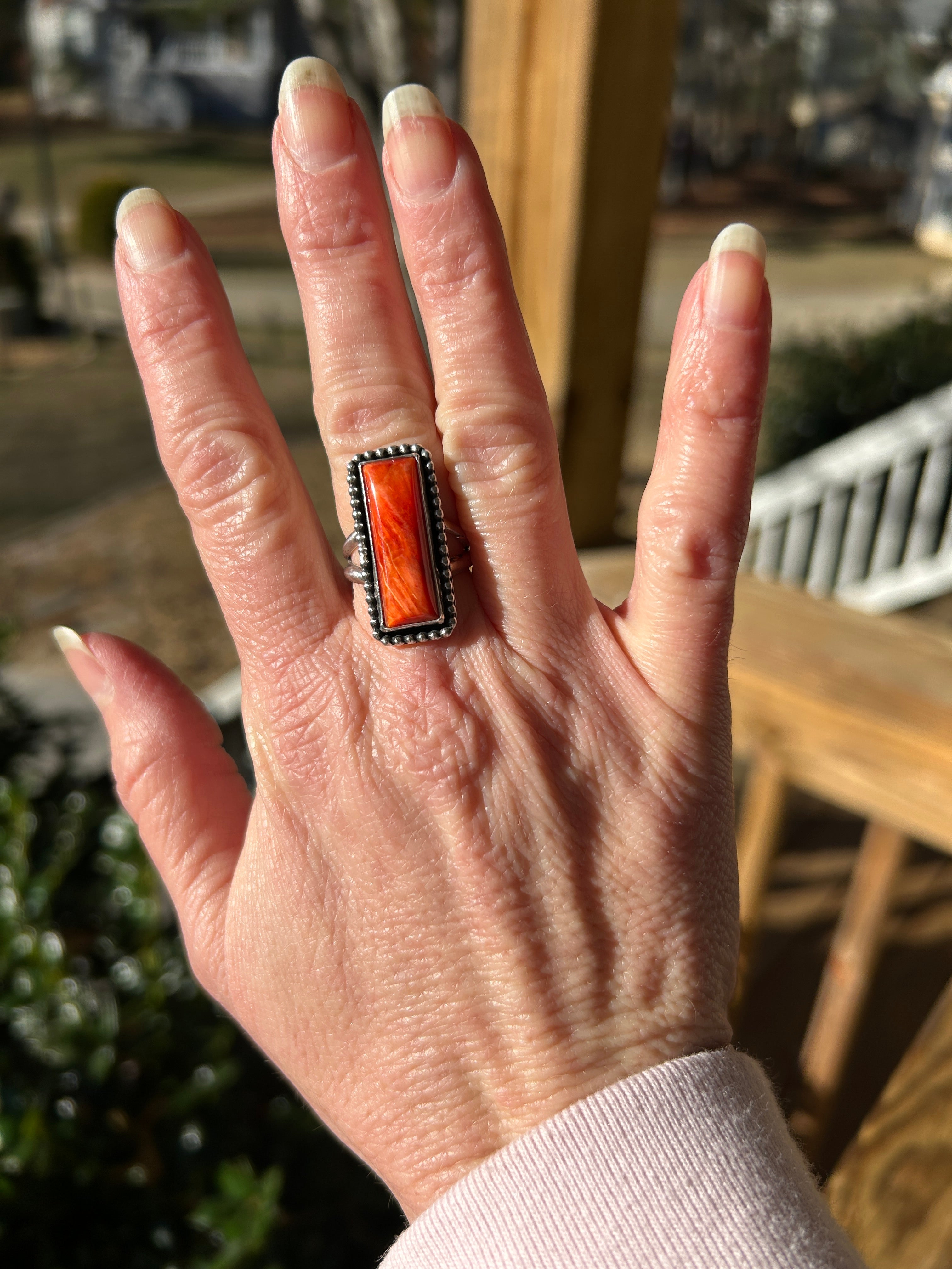 Orange spiny bar ring size 6.75