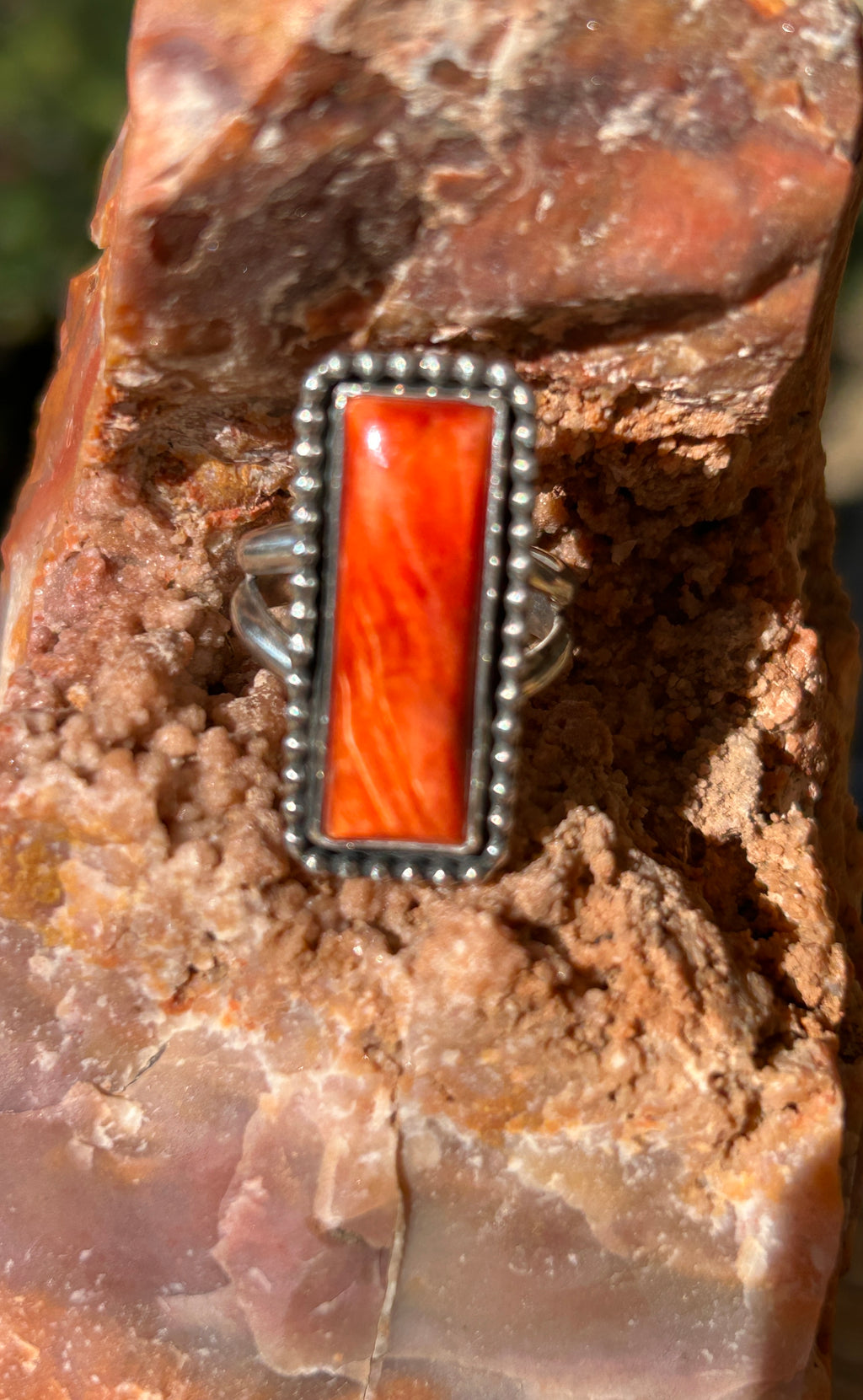 Orange spiny bar ring size 6.75
